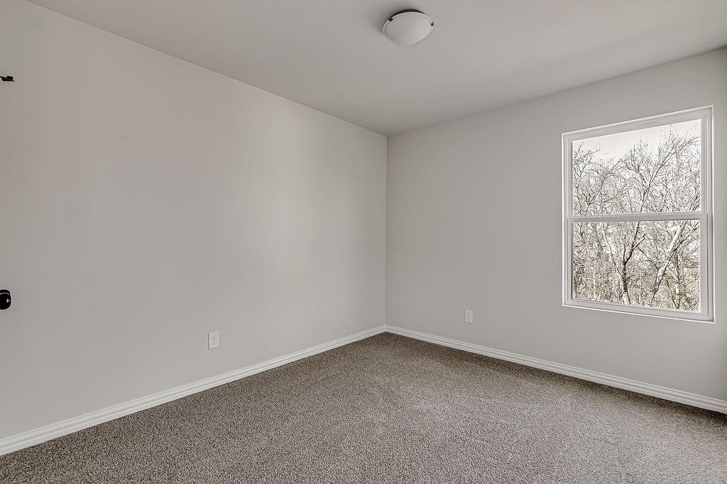 333 North Field Street Burleson, TX 76028 - Photo 20 of 35 an empty room with a window