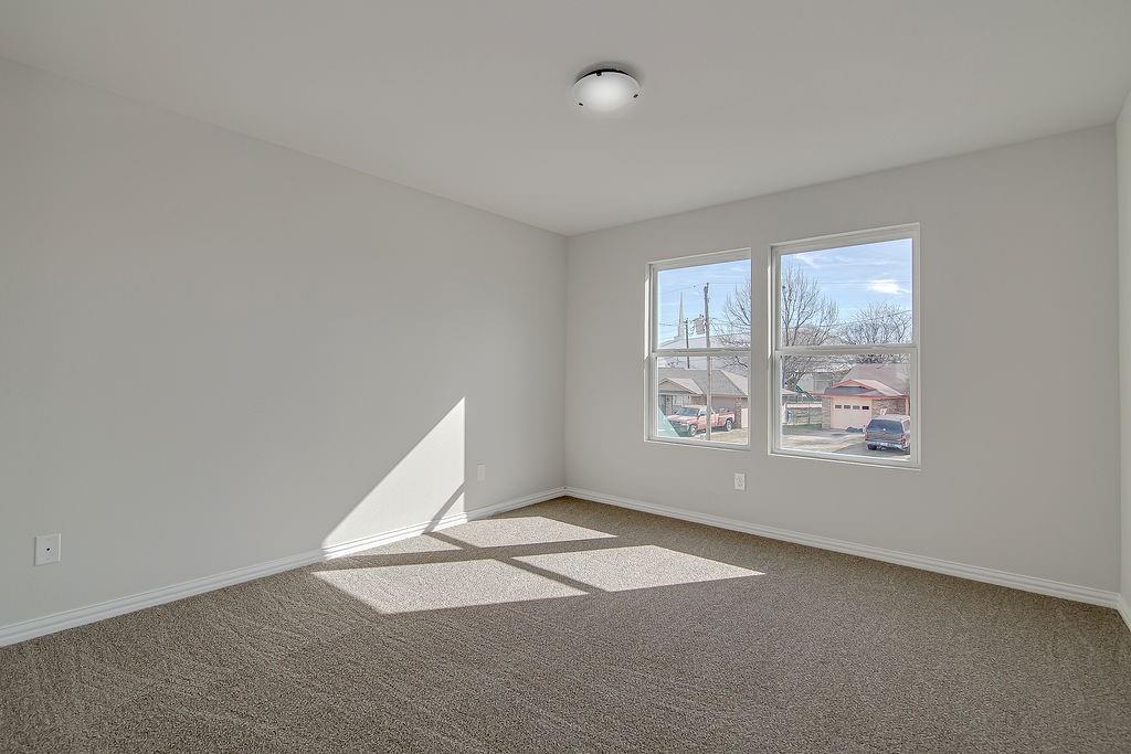 333 North Field Street Burleson, TX 76028 - Photo 33 of 35 an empty room with windows