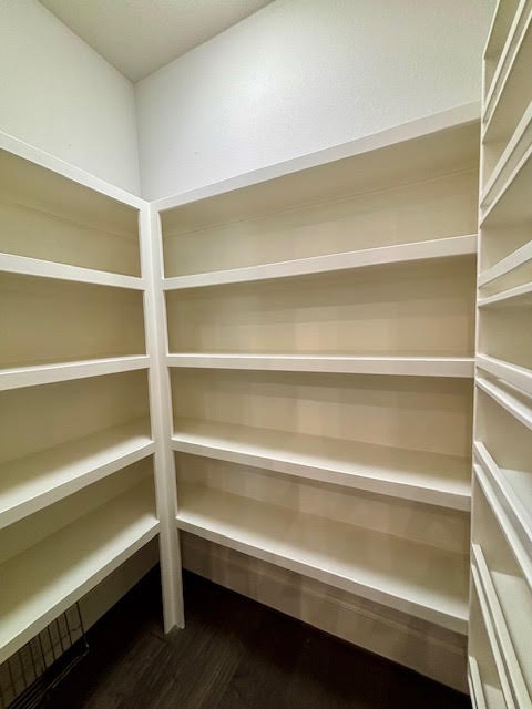 8970 Navigation Circle Montgomery, TX 77316 - Photo 20 of 47 a view of walk in closet with empty racks