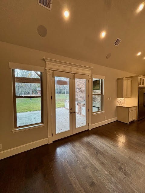 8970 Navigation Circle Montgomery, TX 77316 - Photo 22 of 47 a view of an empty room with a window and wooden floor