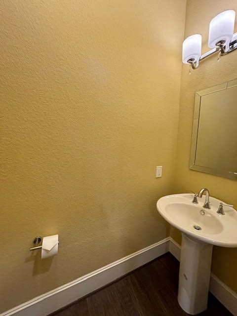 8970 Navigation Circle Montgomery, TX 77316 - Photo 23 of 47 a bathroom with a sink and a mirror