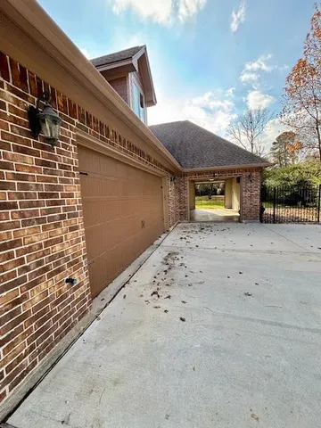 a view of an entrance gate of the house