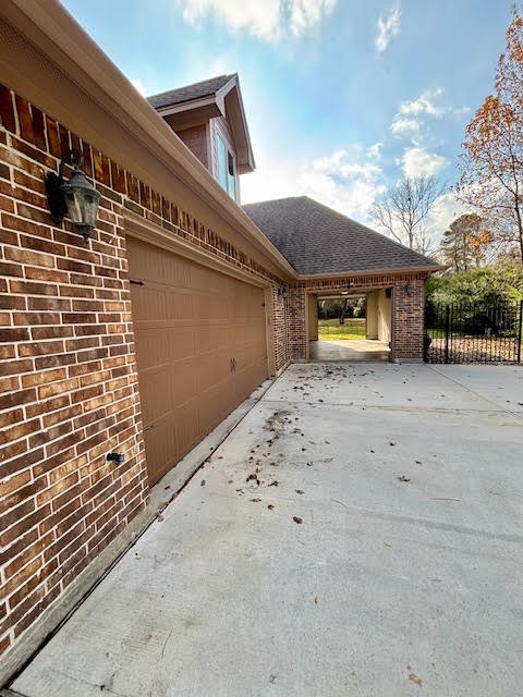 8970 Navigation Circle Montgomery, TX 77316 - Photo 41 of 47 a view of an entrance gate of the house