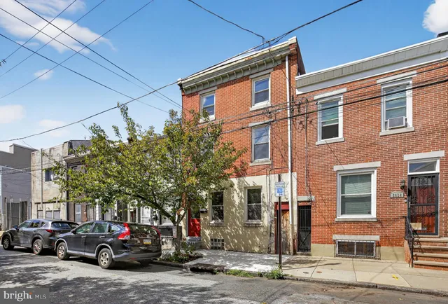 a car parked in front of a building