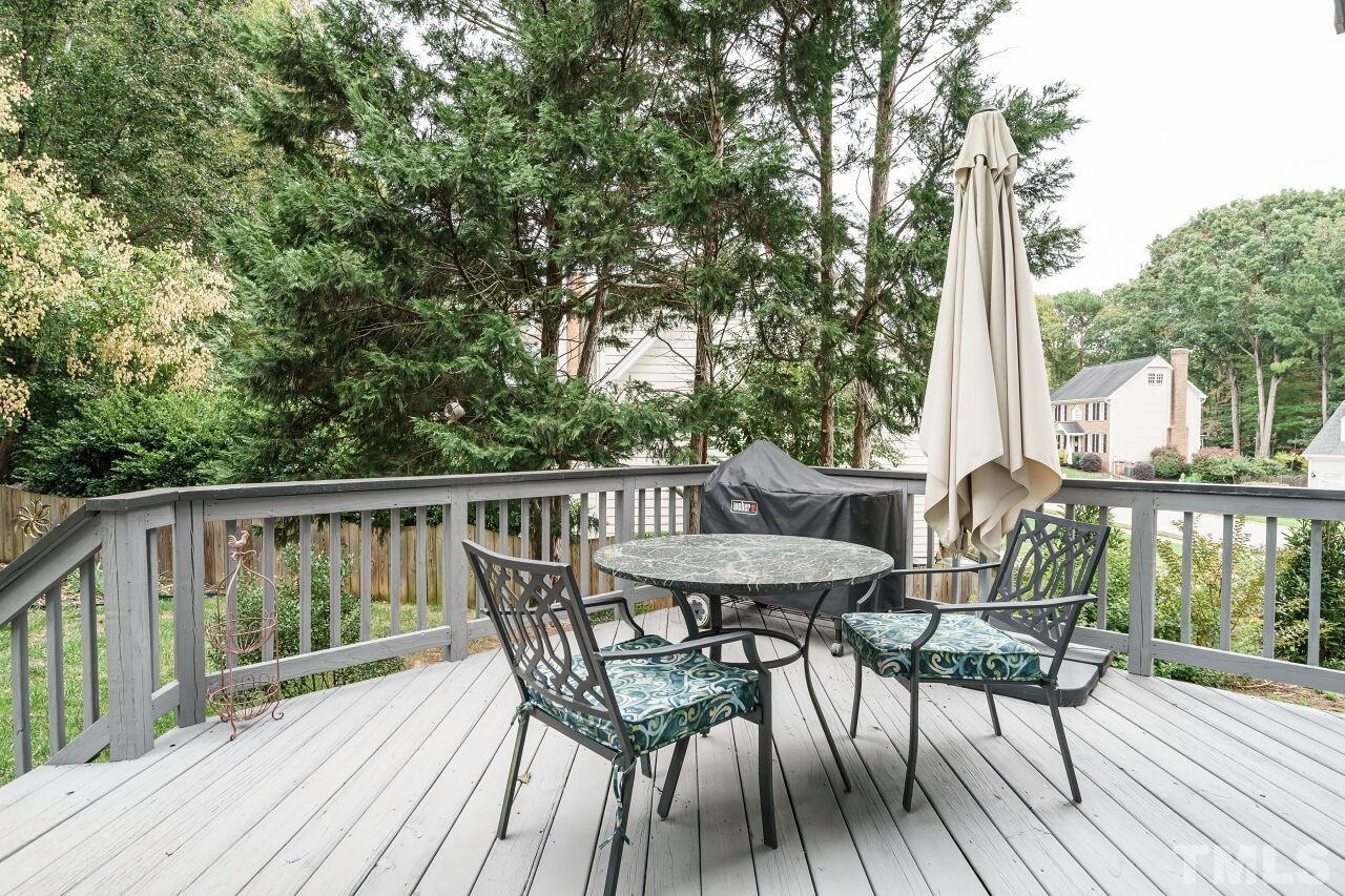 7800 Laurel Mountain Road Raleigh, NC 27613 - Photo 26 of 31 a view of balcony with furniture and wooden floor