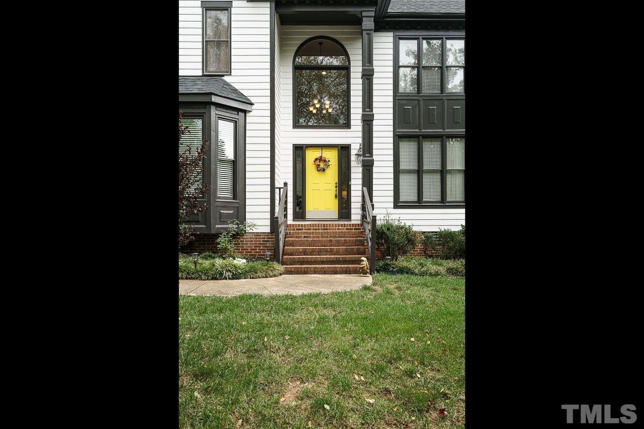 7800 Laurel Mountain Road Raleigh, NC 27613 - Photo 31 of 31 a view of a front door of the house and front door
