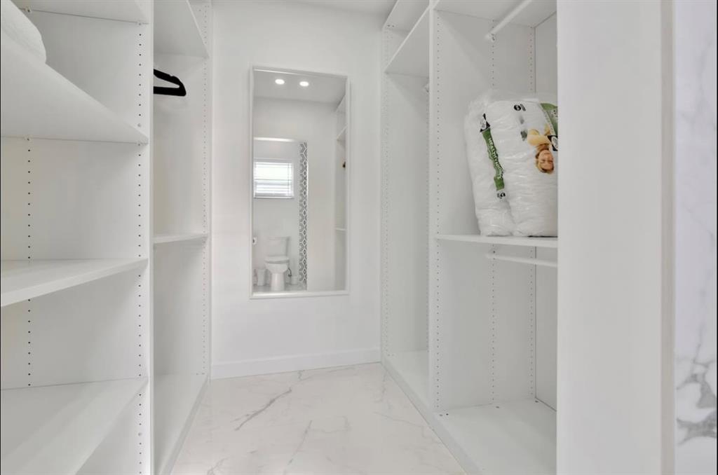 105 Orchard Ridge Lane Boca Raton, FL 33431 - Photo 13 of 24 a bathroom with a shower