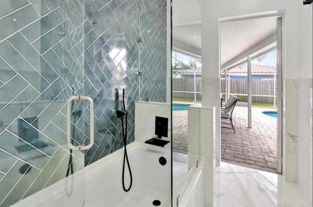 105 Orchard Ridge Lane Boca Raton, FL 33431 - Photo 14 of 24 a view of a livingroom with furniture and floor to ceiling window