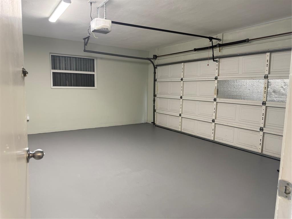 105 Orchard Ridge Lane Boca Raton, FL 33431 - Photo 19 of 24 a view of a garage