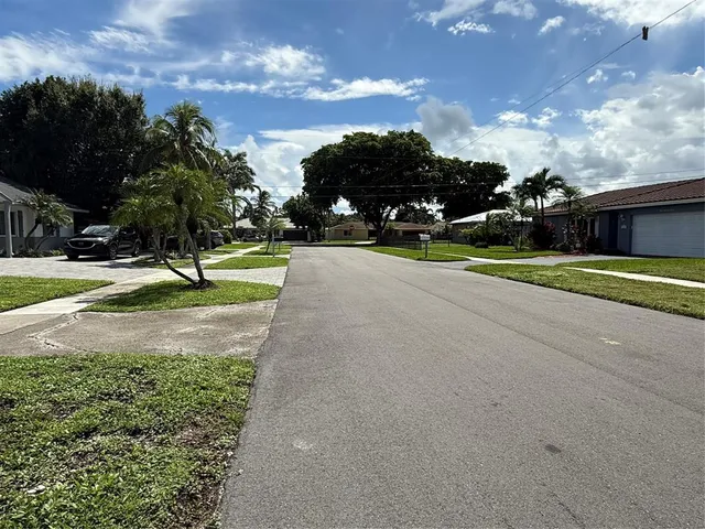 a view of street with houses