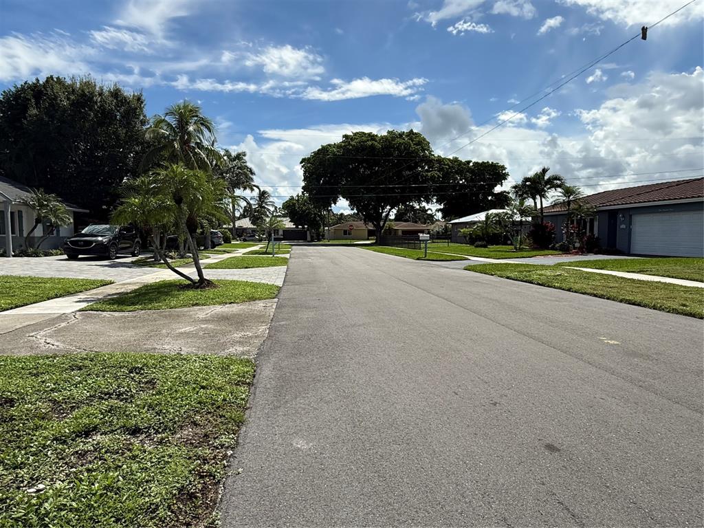 105 Orchard Ridge Lane Boca Raton, FL 33431 - Photo 24 of 24 a view of street with houses