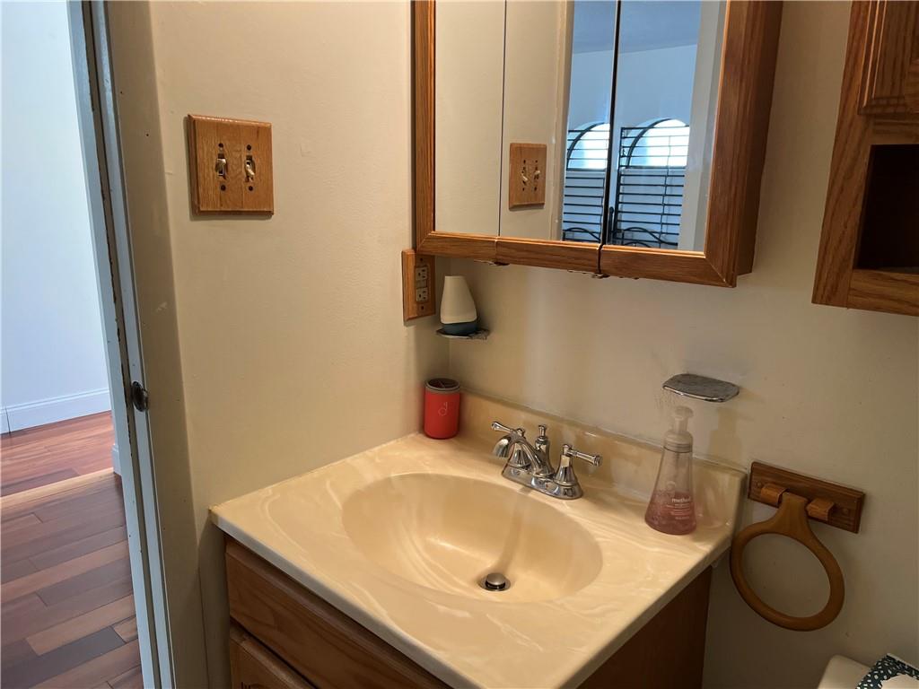 3256 Kennett Square Pittsburgh, PA 15213 - Photo 12 of 15 a bathroom with a sink and a mirror