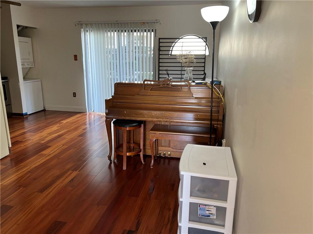 3256 Kennett Square Pittsburgh, PA 15213 - Photo 2 of 15 a room with furniture a window and wooden floor