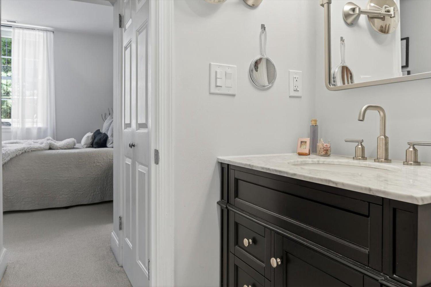 410 5th Street Northeast, Unit 1 Washington, DC 20002 - Photo 15 of 37 Renovated primary bathroom with modern fixtures.