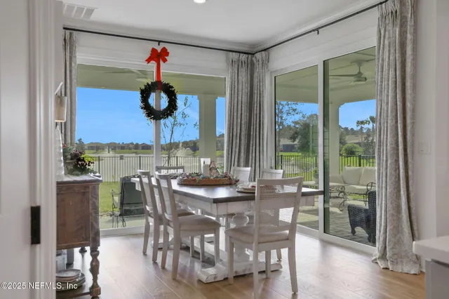 a spacious bedroom with a bed and cabinets
