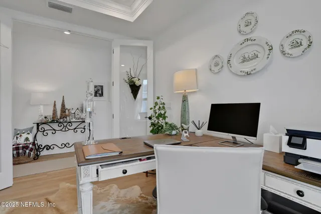 a bathroom with a sink a toilet and shower curtain
