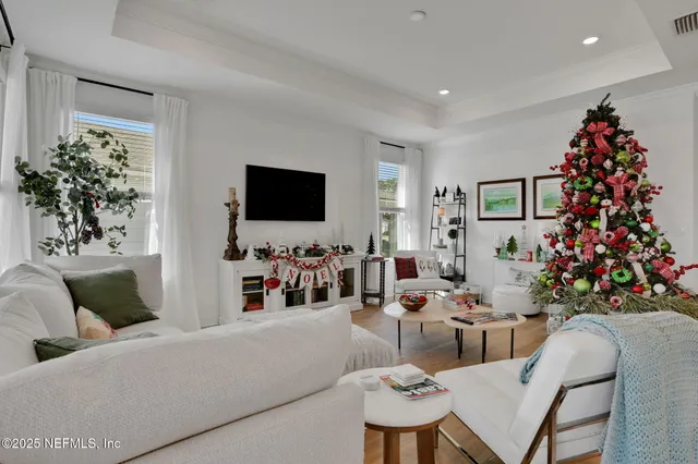 a kitchen with stainless steel appliances granite countertop a sink and white cabinets