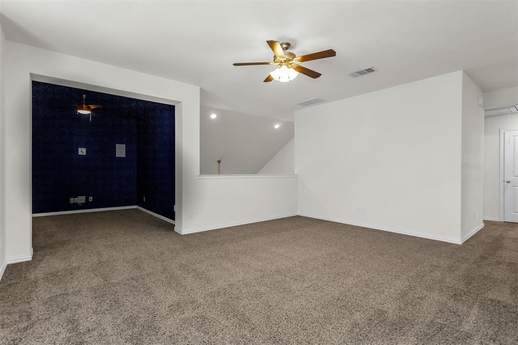 15713 Canyon Ridge Prosper, TX 75078 - Photo 28 of 38 Carpeted secondary living space featuring a ceiling fan, recessed lighting, and a distinct alcove with dark blue textured walls and an additional ceiling fan