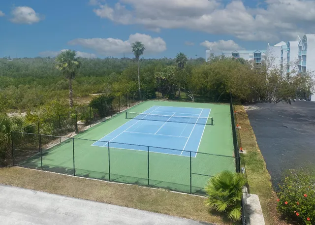 a view of an empty room with windows