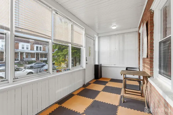 a view of a room with a large window