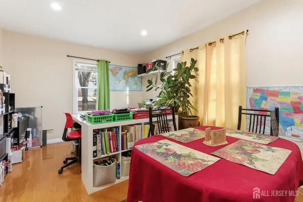 a room with furniture and a rug