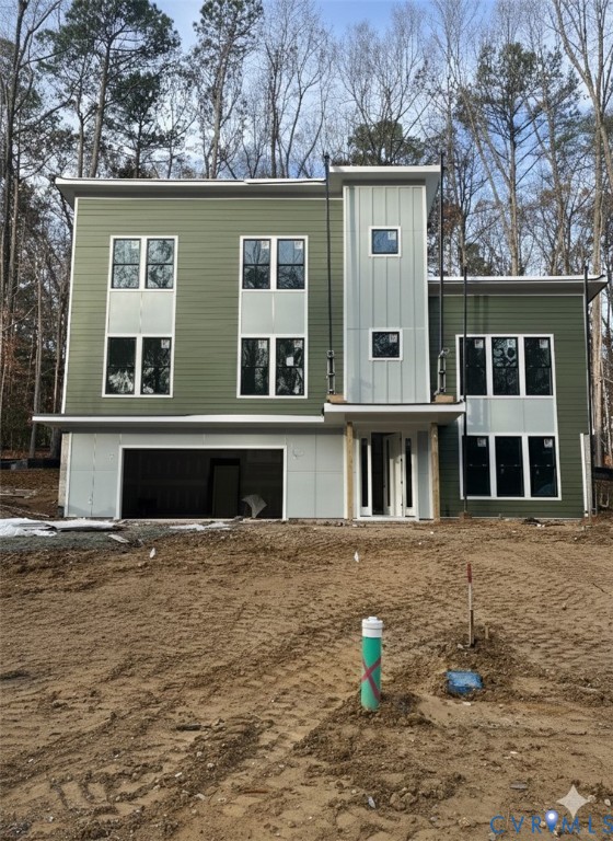 3014 Bradwill Road Richmond, VA 23225 - Photo 3 of 13 a front view of a house with a yard
