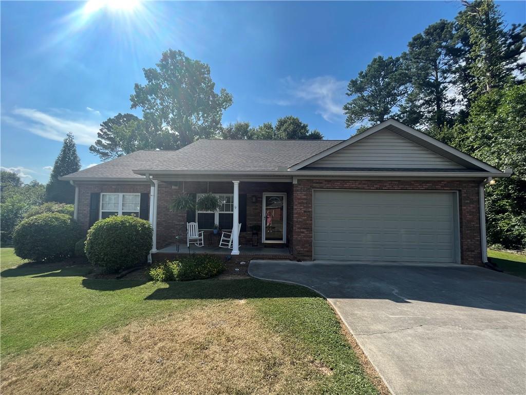 3 Graben Drive Northwest Rome, GA 30165 - Photo 1 of 1 a front view of a house with a yard and garage