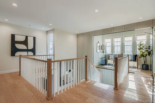 a view of entryway with wooden floor