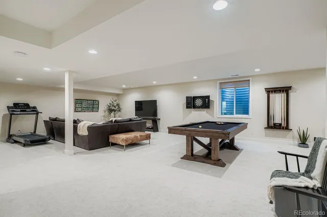 a living room with furniture and a table