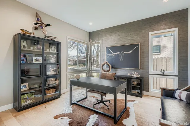 a workspace with furniture and window