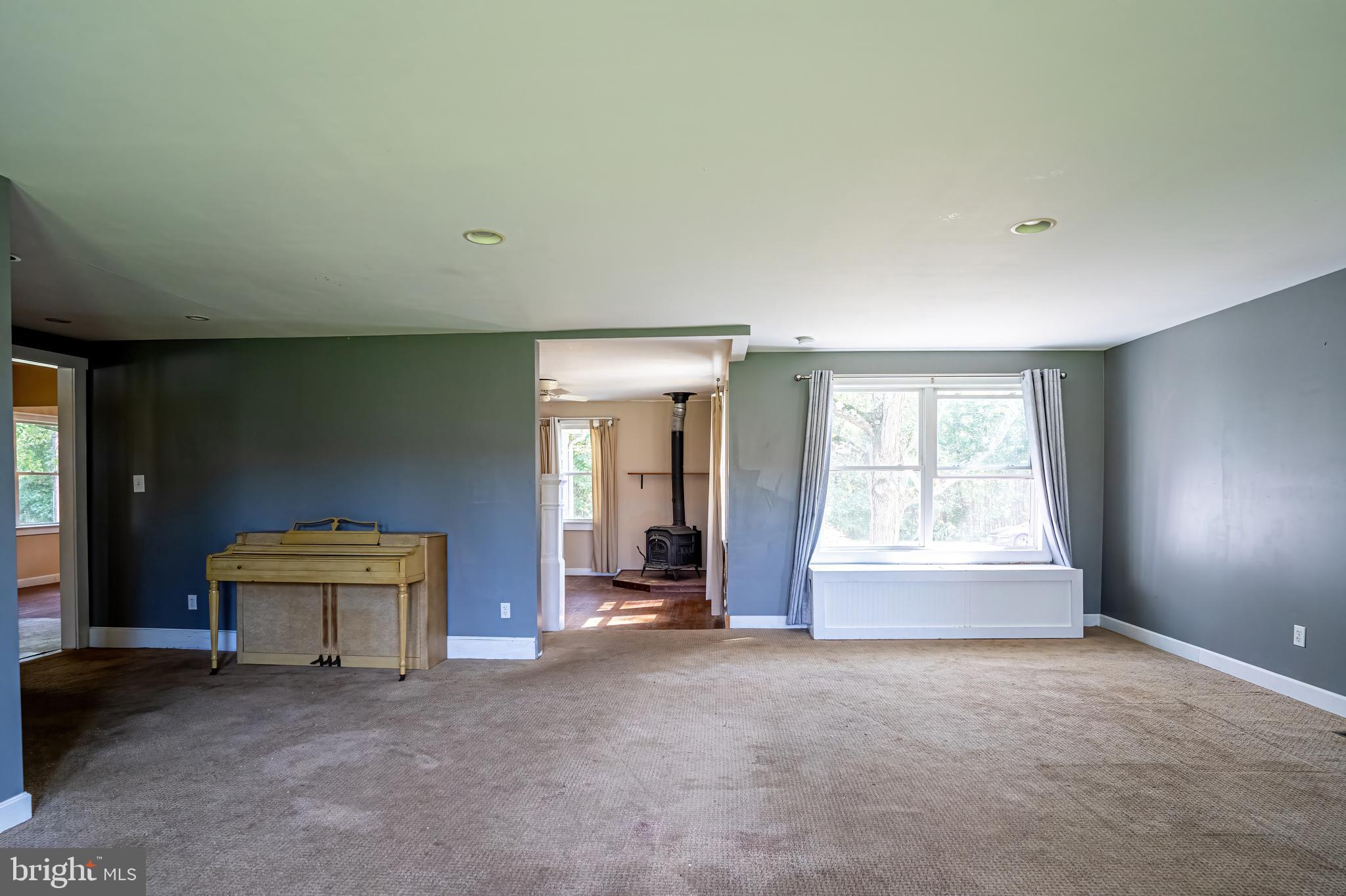 74 Woods Road Hightstown, NJ 08520 - Photo 11 of 57 an empty room with windows and closet