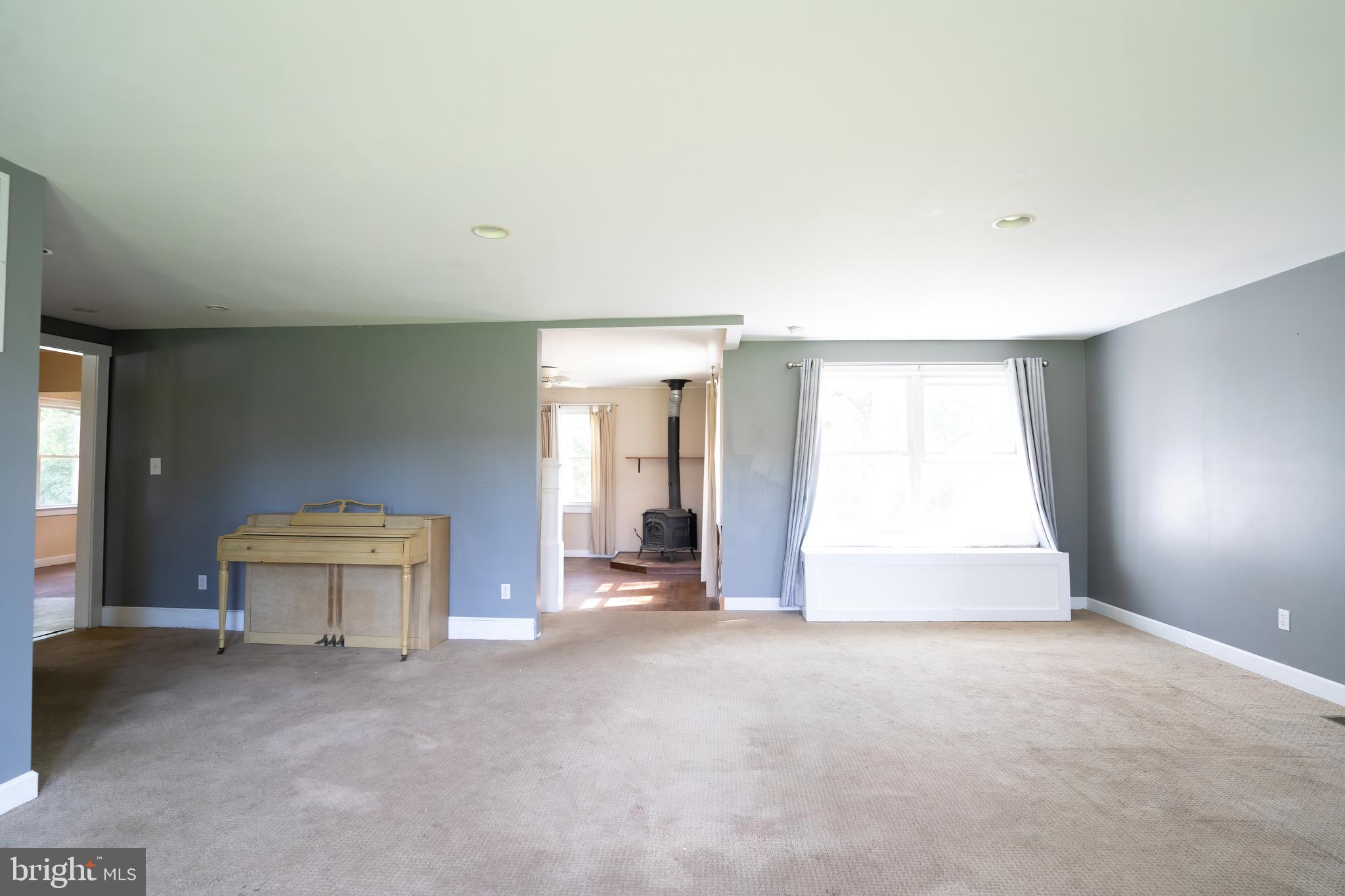 74 Woods Road Hightstown, NJ 08520 - Photo 13 of 57 a view of an empty room with a window