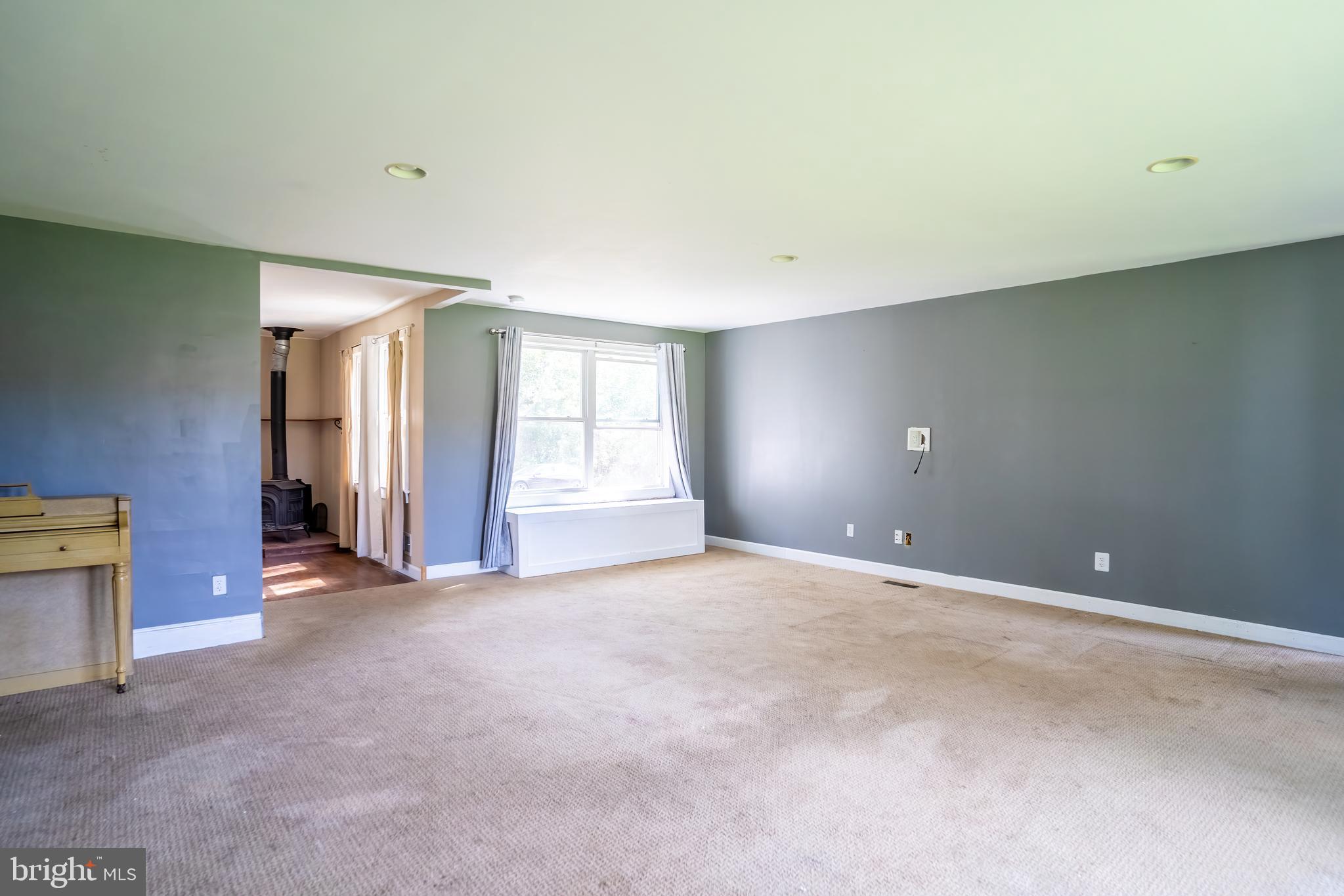 74 Woods Road Hightstown, NJ 08520 - Photo 15 of 57 an empty room with windows and closet