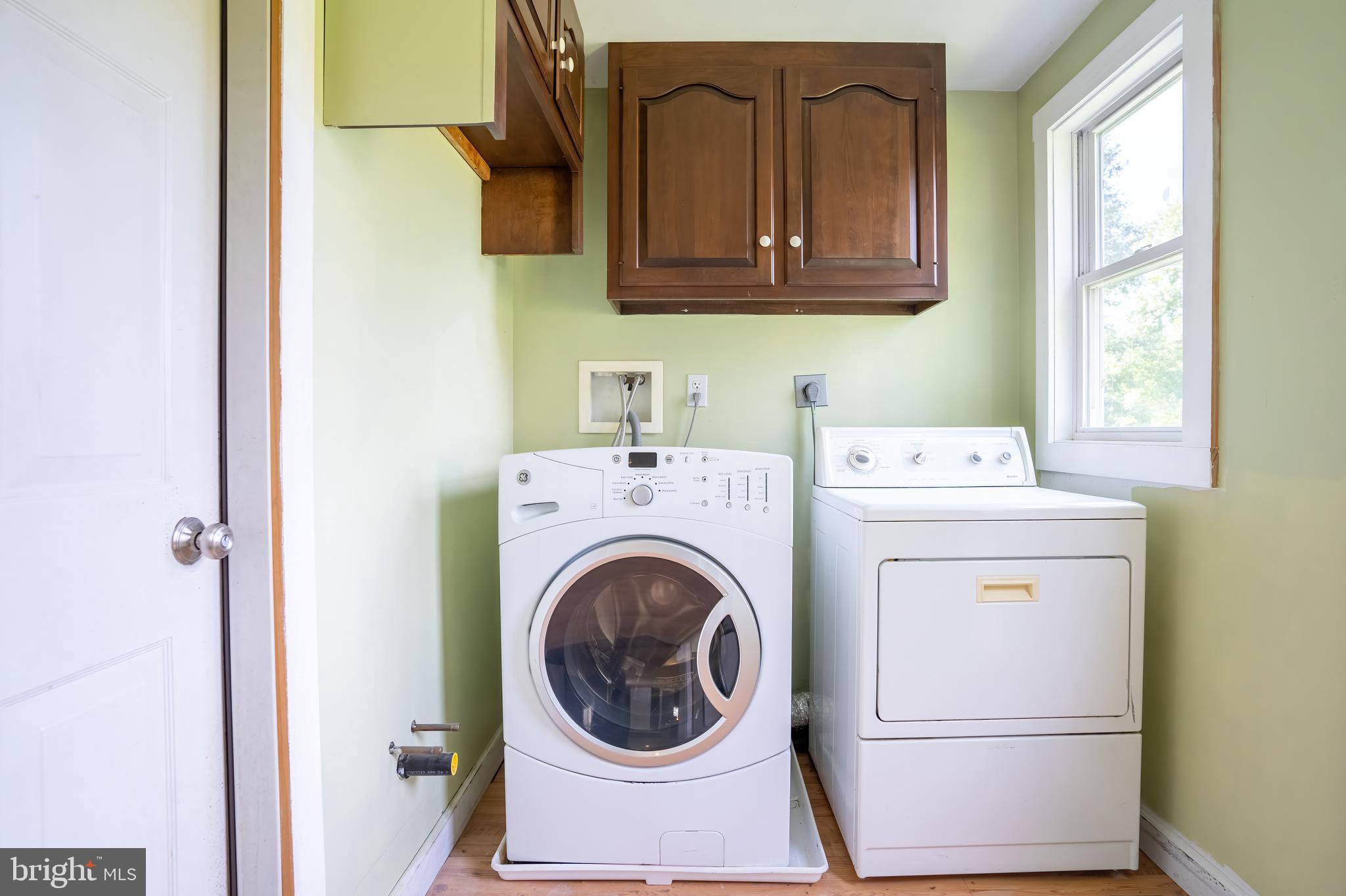 74 Woods Road Hightstown, NJ 08520 - Photo 16 of 57 a utility room with dryer and washer