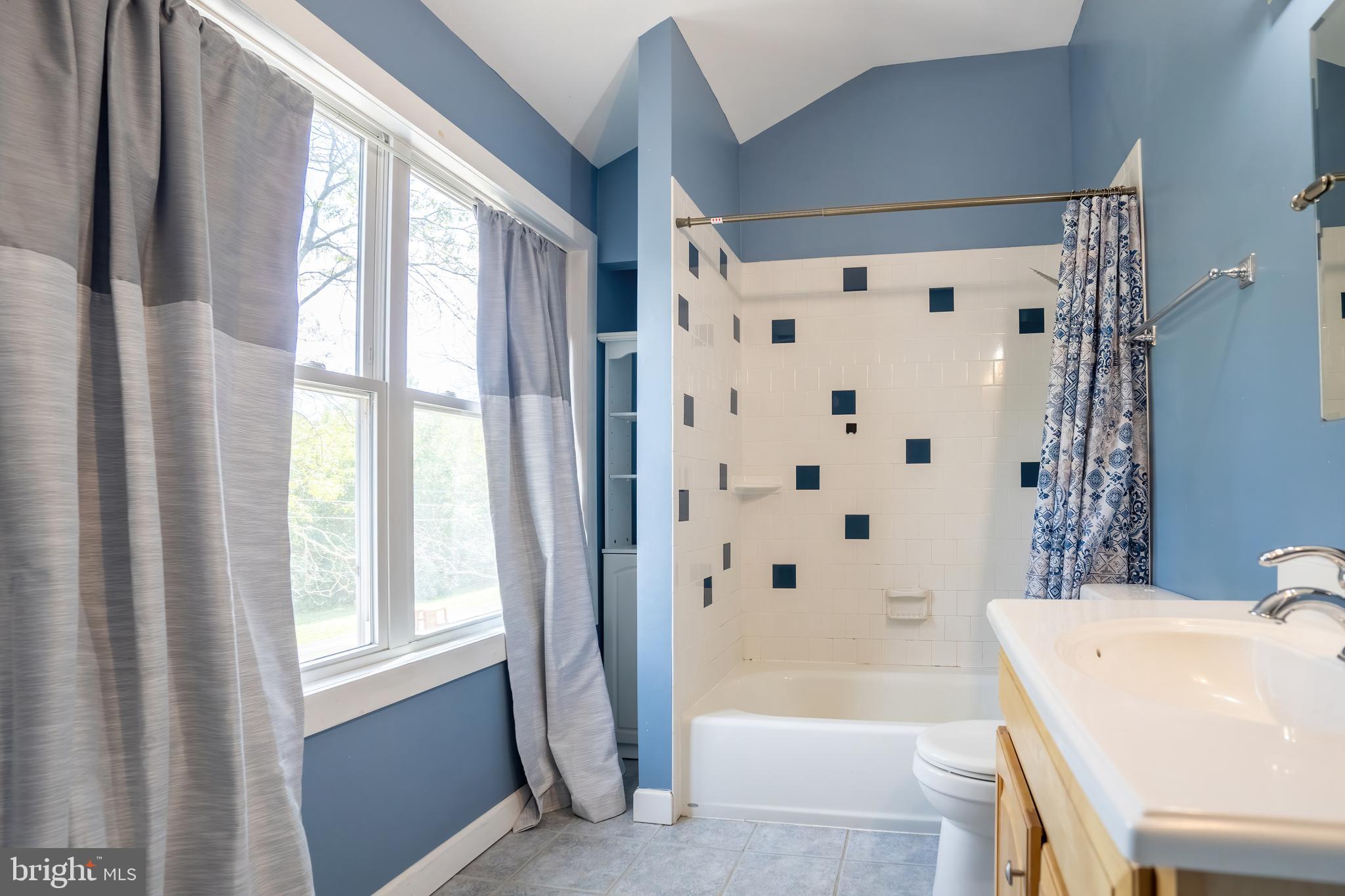74 Woods Road Hightstown, NJ 08520 - Photo 33 of 57 a bathroom with a bathtub a sink and a shower