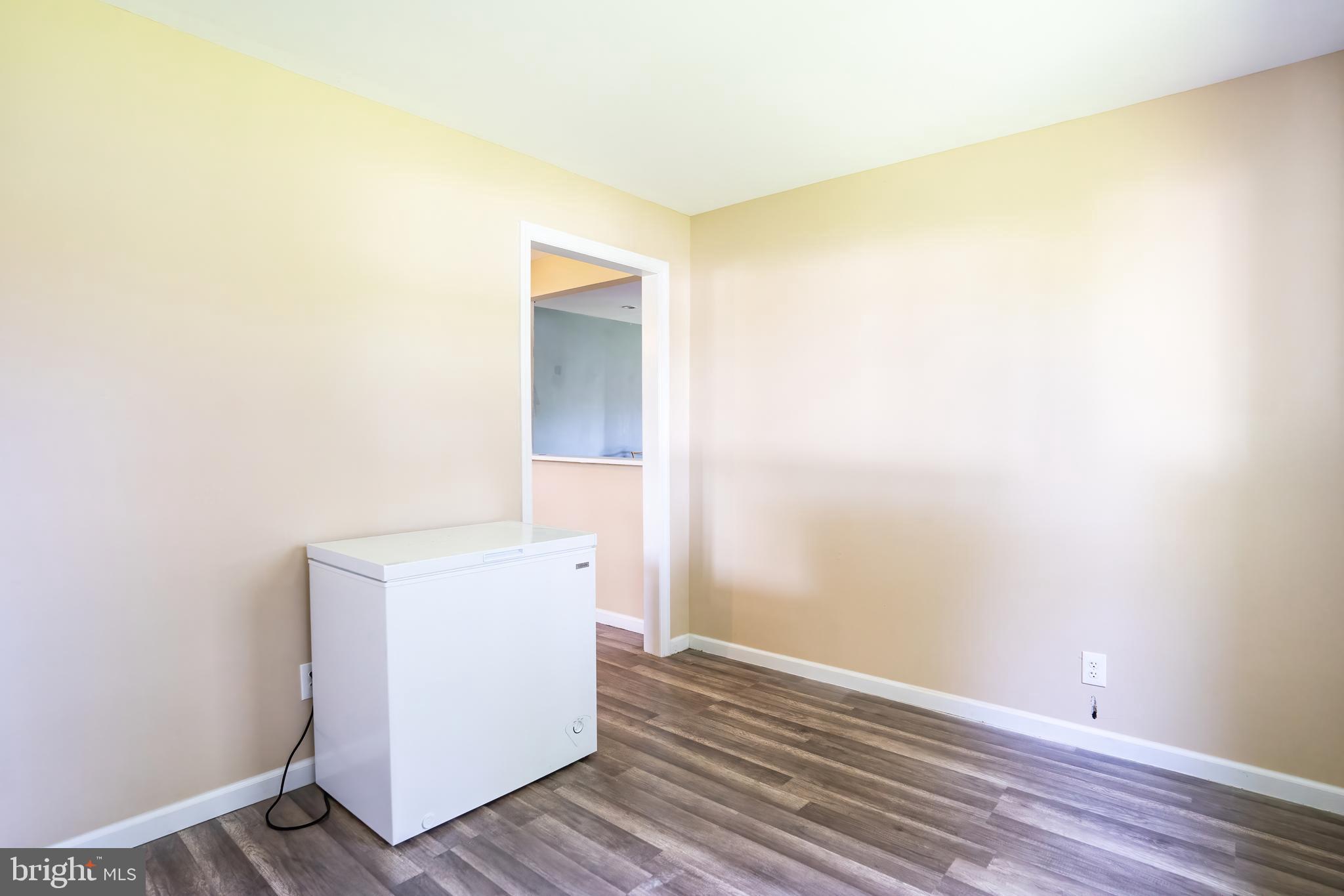 74 Woods Road Hightstown, NJ 08520 - Photo 45 of 57 a view of utility room with wooden floor