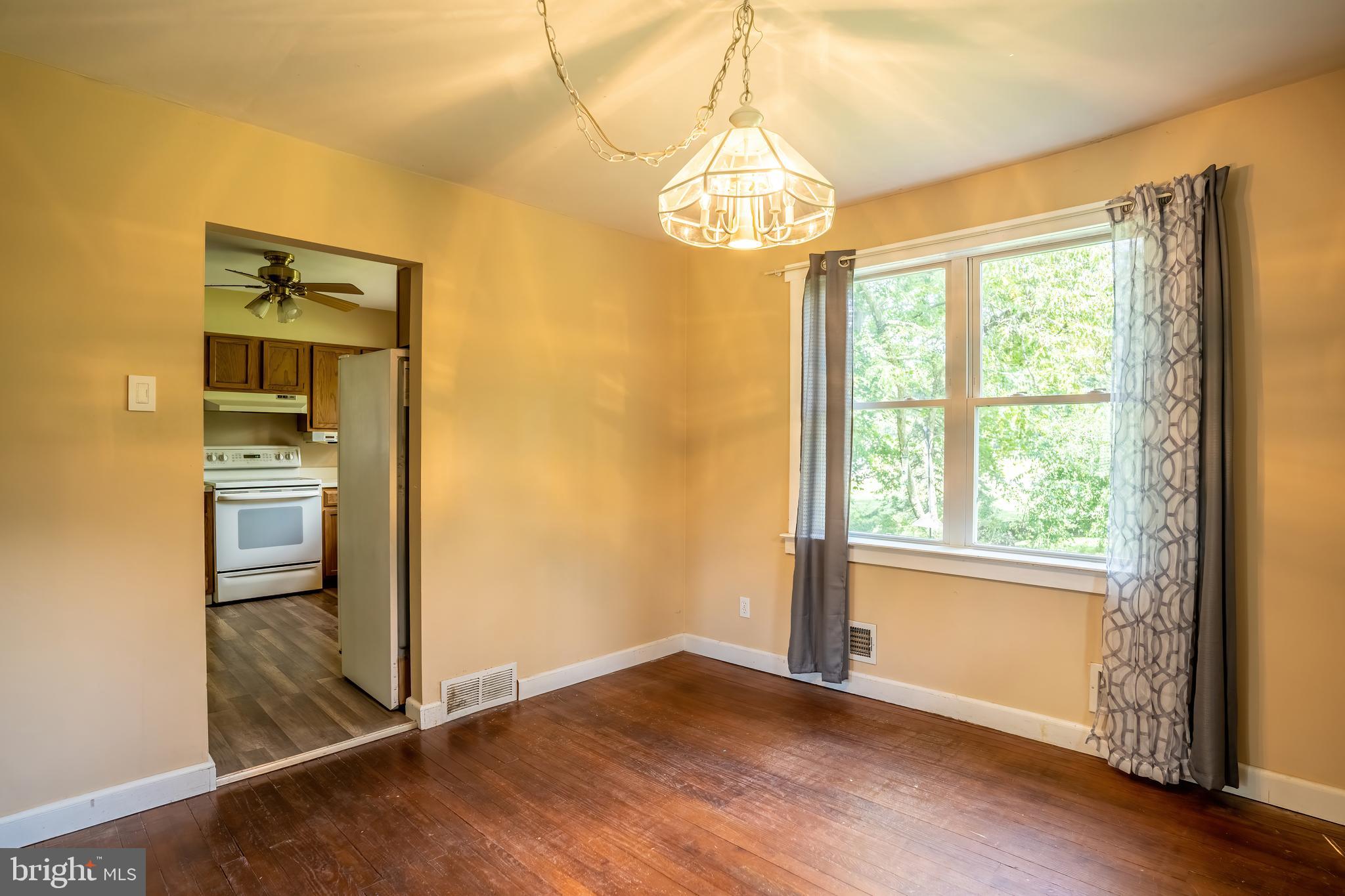 74 Woods Road Hightstown, NJ 08520 - Photo 46 of 57 a view of empty room with wooden floor and fan
