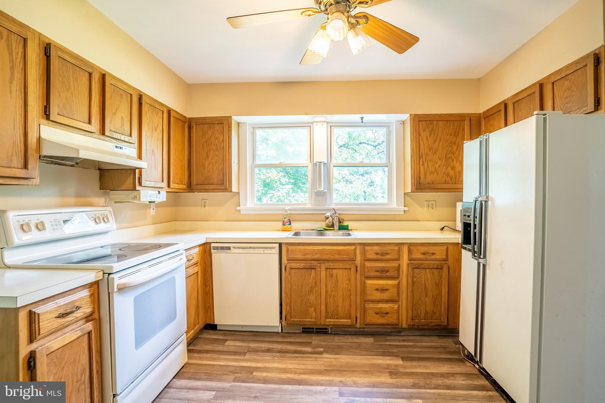 74 Woods Road Hightstown, NJ 08520 - Photo 48 of 57 a kitchen with stainless steel appliances granite countertop a refrigerator and a sink