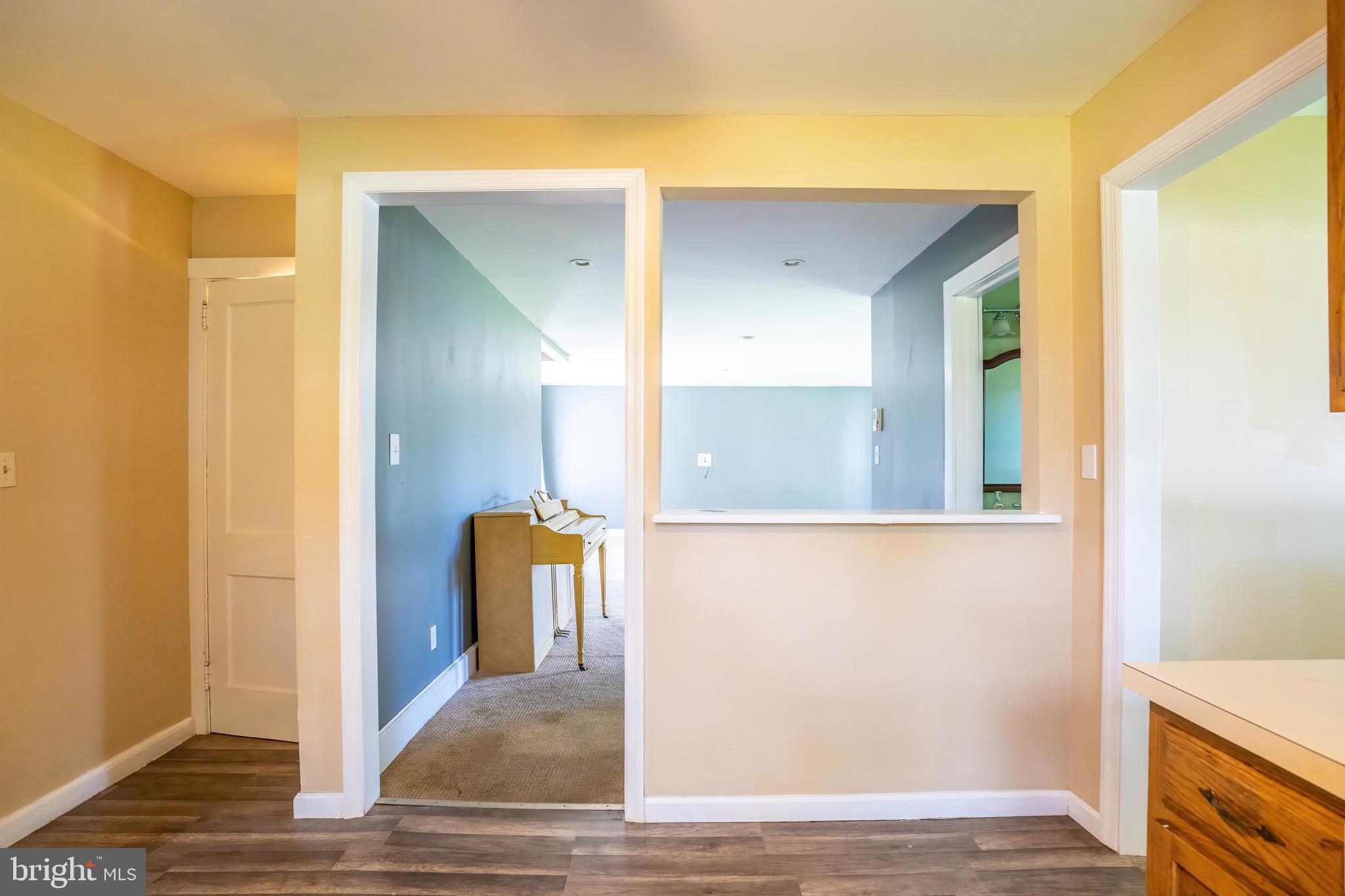 74 Woods Road Hightstown, NJ 08520 - Photo 50 of 57 a view of a hallway with wooden floor