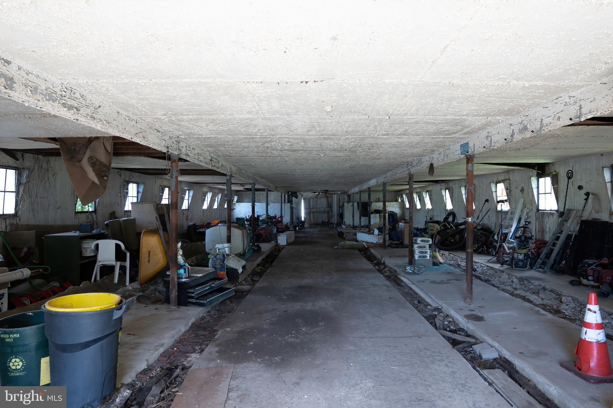 74 Woods Road Hightstown, NJ 08520 - Photo 53 of 57 a view of a patio with chairs and potted plants