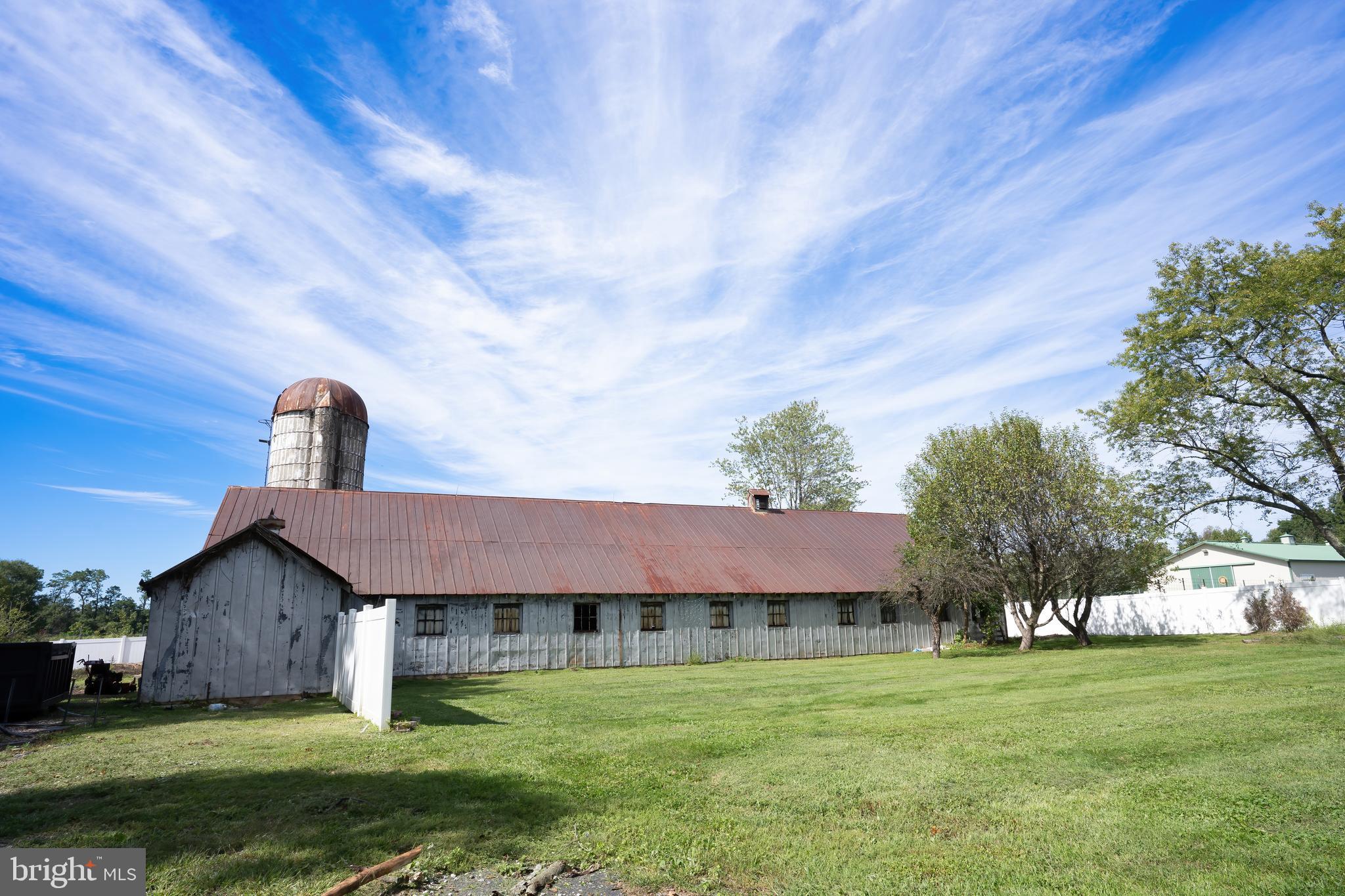74 Woods Road Hightstown, NJ 08520 - Photo 54 of 57 a front view of a house with garden