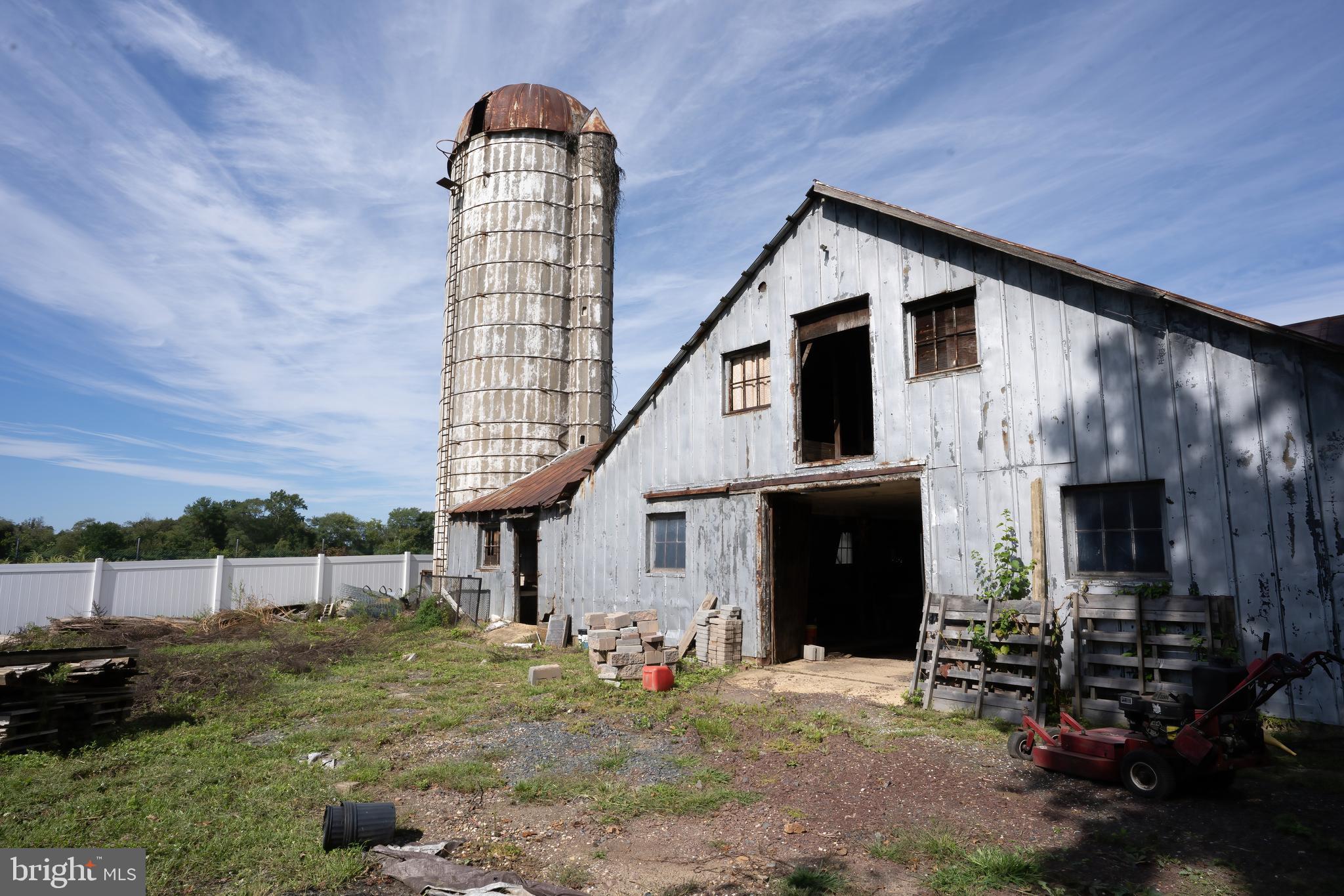 74 Woods Road Hightstown, NJ 08520 - Photo 56 of 57 a front view of a house with garden