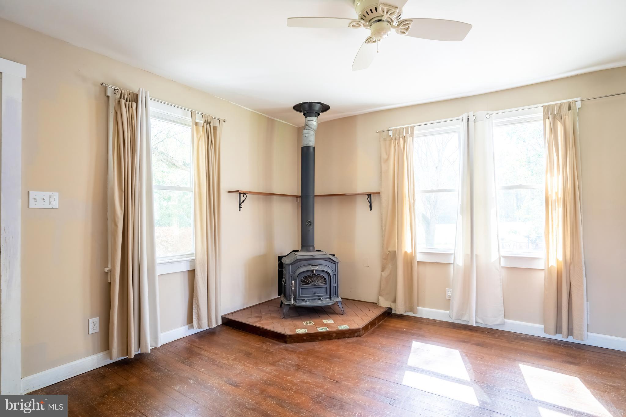 74 Woods Road Hightstown, NJ 08520 - Photo 6 of 57 a view of a livingroom with furniture and a window