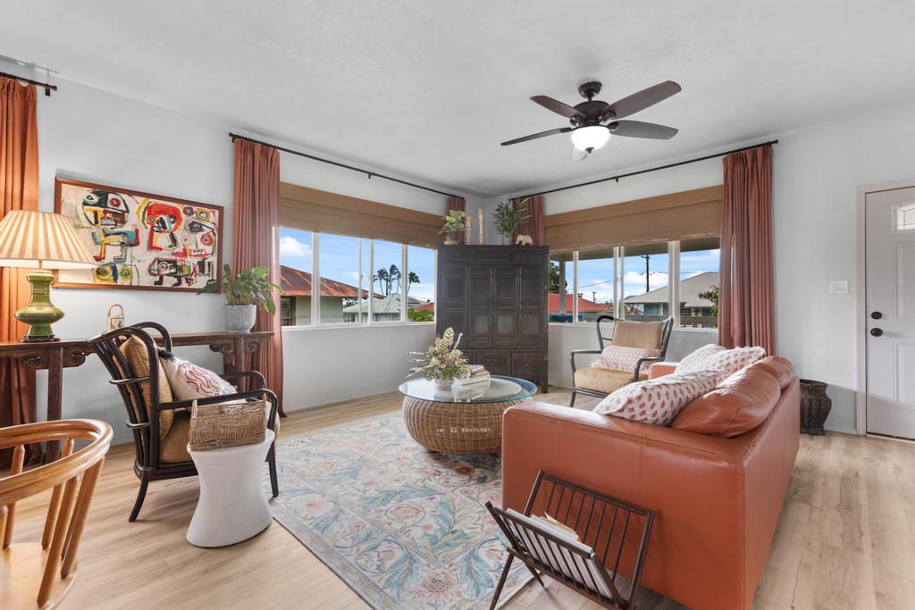 20 Alae Street Hilo, HI 96720 - Photo 10 of 30 a living room with furniture and a large window