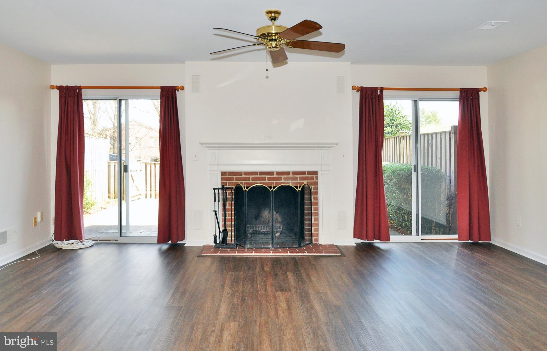 4847 Sangamore Road, Unit 24 Bethesda, MD 20816 - Photo 13 of 31 Living area with wood burning fireplace