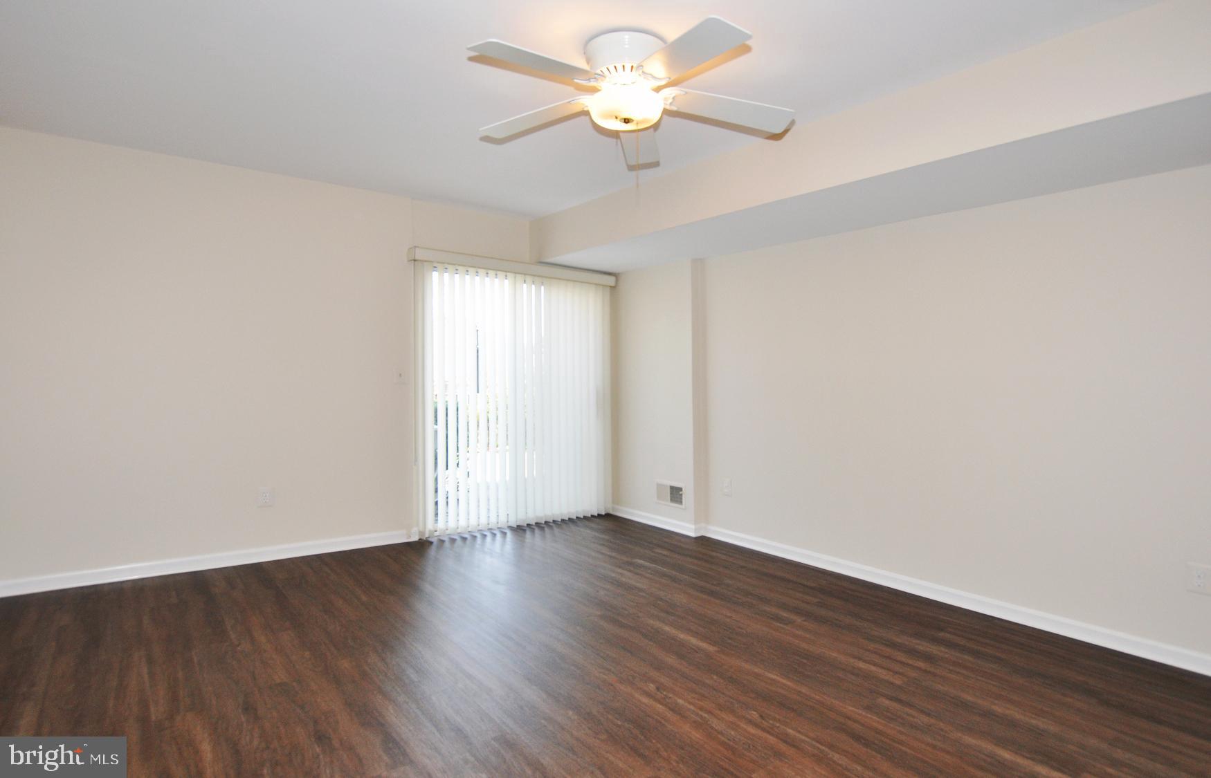4847 Sangamore Road, Unit 24 Bethesda, MD 20816 - Photo 22 of 31 Bedroom #2 with exit to patio