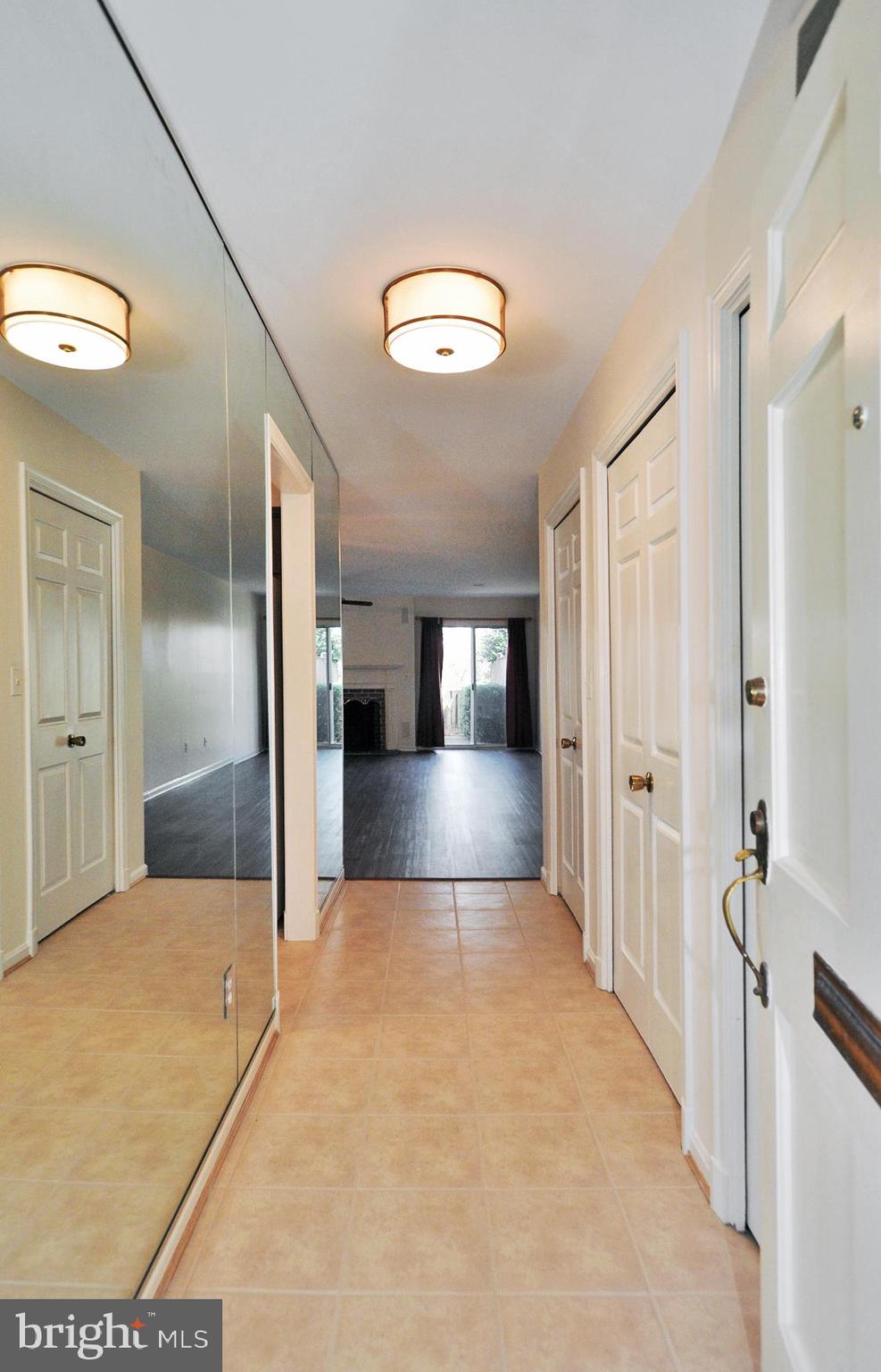 4847 Sangamore Road, Unit 24 Bethesda, MD 20816 - Photo 4 of 31 Entry Hall view through to rear