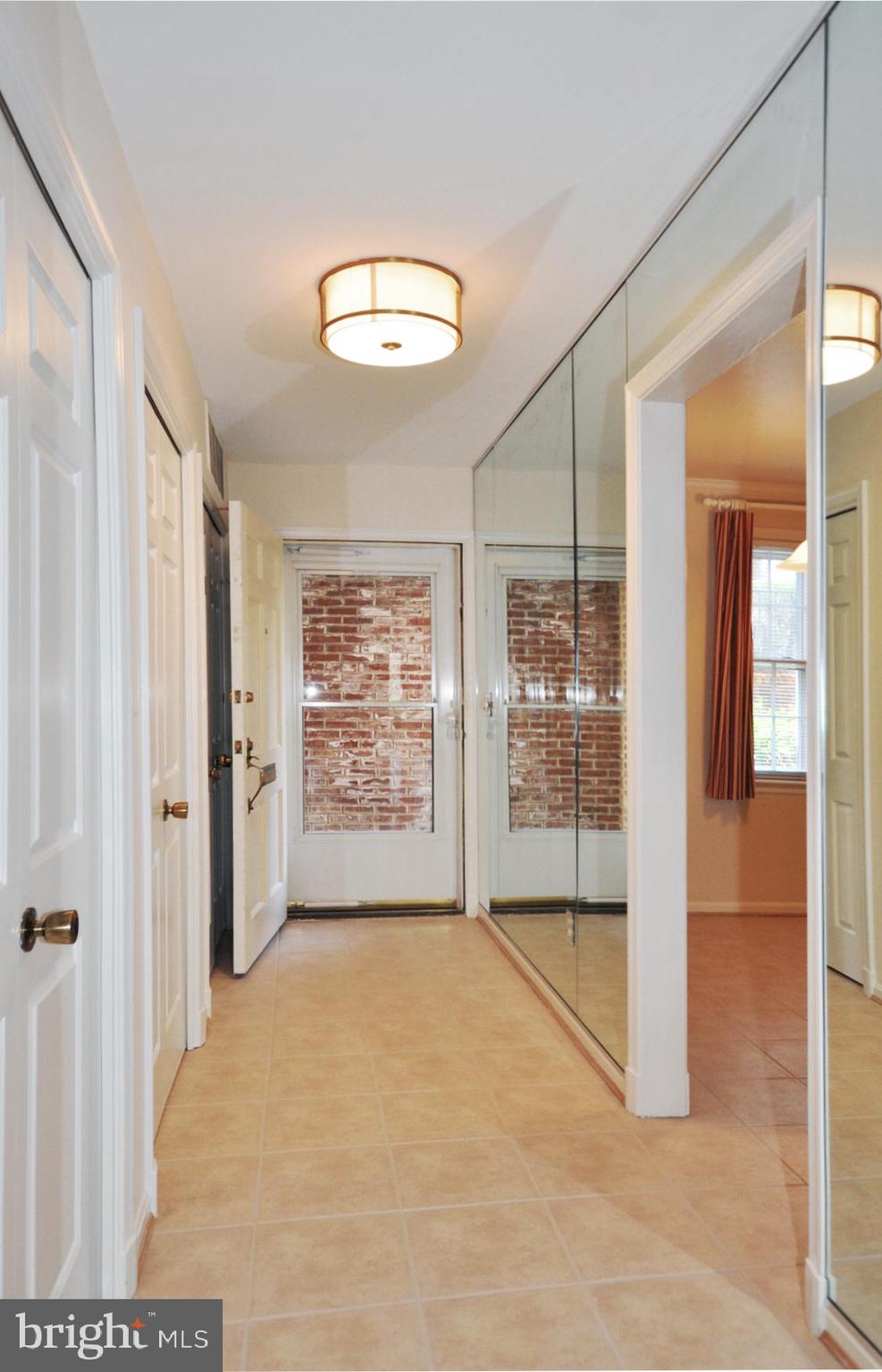 4847 Sangamore Road, Unit 24 Bethesda, MD 20816 - Photo 5 of 31 Entry Hall and front door