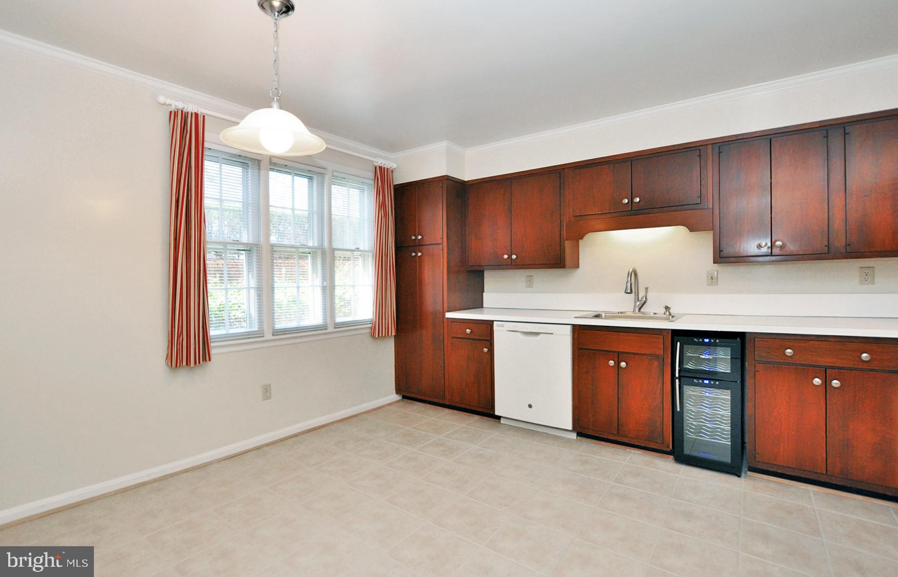 4847 Sangamore Road, Unit 24 Bethesda, MD 20816 - Photo 6 of 31 Table space Kitchen with big window