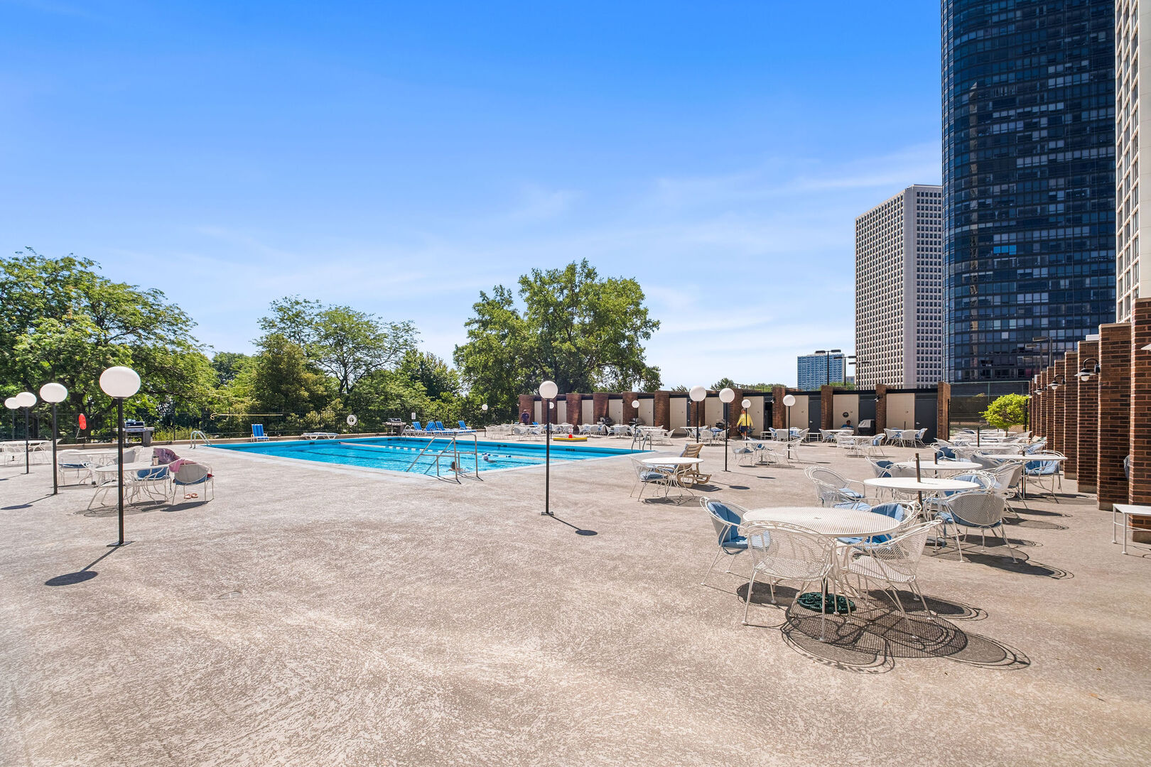 5455 North Sheridan Road, Unit 2003 Chicago, IL 60640 - Photo 20 of 23 a view of a swimming pool and lounge chairs